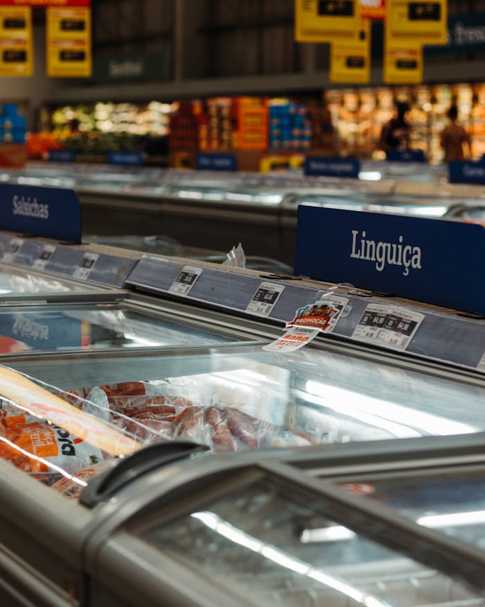 The Art of Drawing Readers In: Your attractive post title goes here Frozen meats on display in a Brazilian supermarket aisle. Great for commerce and retail themes.